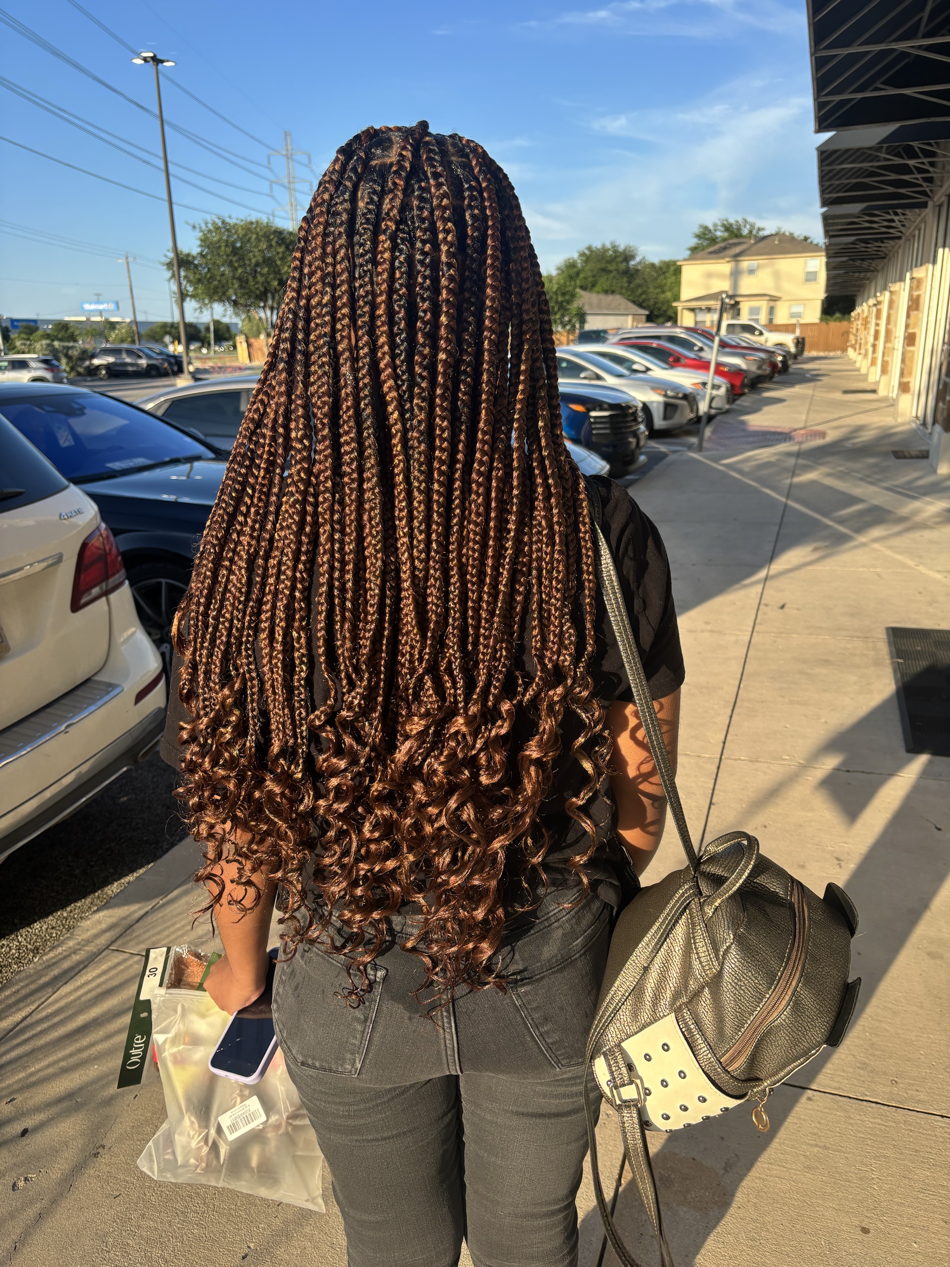 Boho box braids with curly ends