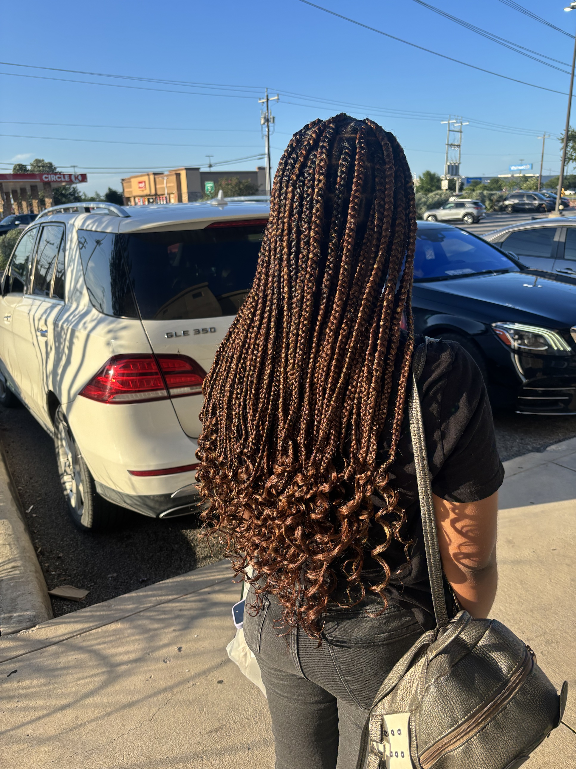 Boho box braids with curly ends, alternate angle