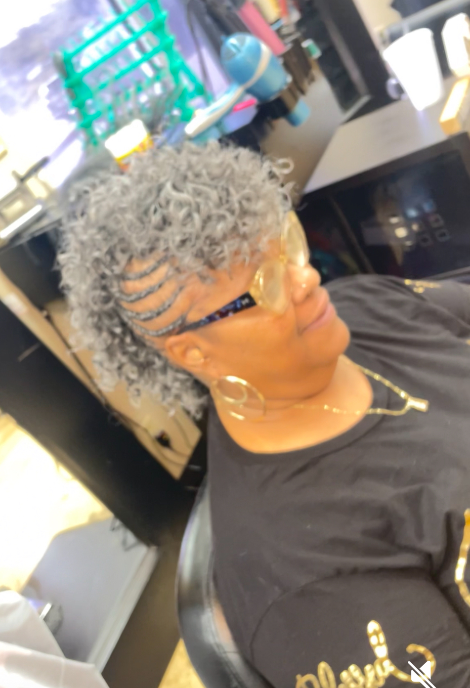 Silver curls with a cornrow accent